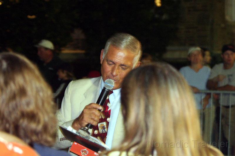 IMG_0214.JPG - Trying to entertain fans waiting for the trolleys before the Hall of Fame dinner. Even though I called out excitedly the answer to, "Who was known as the human vacuum cleaner" the bozo didn't give me the free tickets to the Hall of Fame. Sure the question wasn't posed to me directly, but still, how could I be denied?