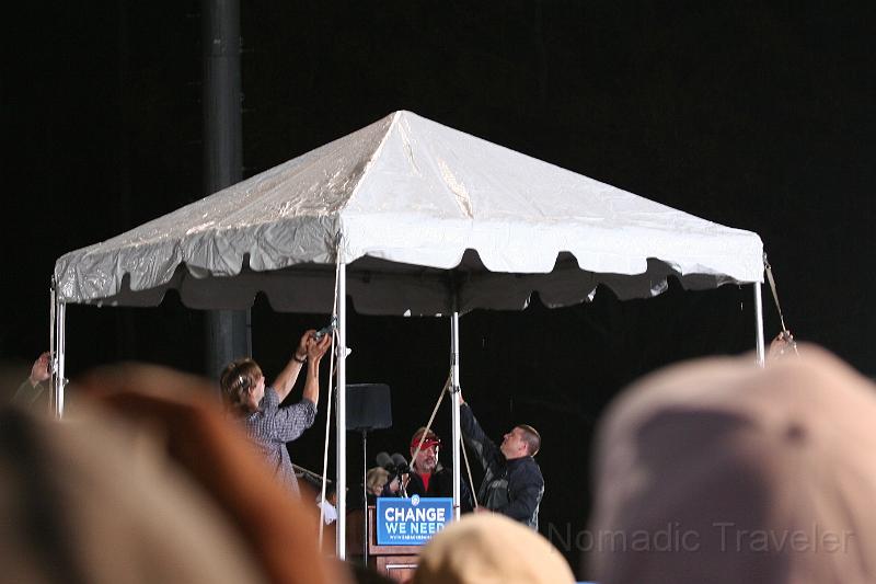 IMG_9944.JPG - Removing the tent from the podium before Obama arrives.