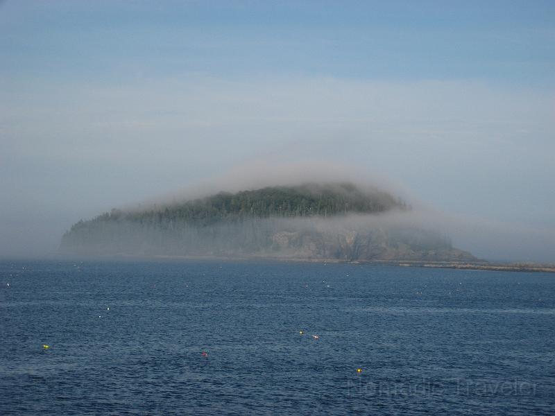 IMG_0186.JPG - The fog reveals part of the island it was covering.